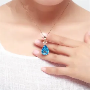 Blue Crystal & Cubic Zirconia Pear Cut Flower Pendant Necklace