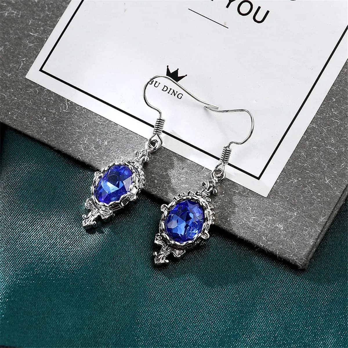Blue Crystal & Silver-Plated Oval Engraved Drop Earrings