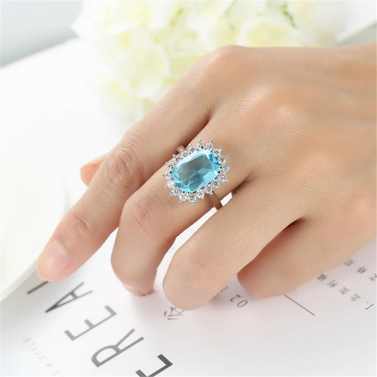 Blue Crystal Princess-Cut Floral Halo Ring