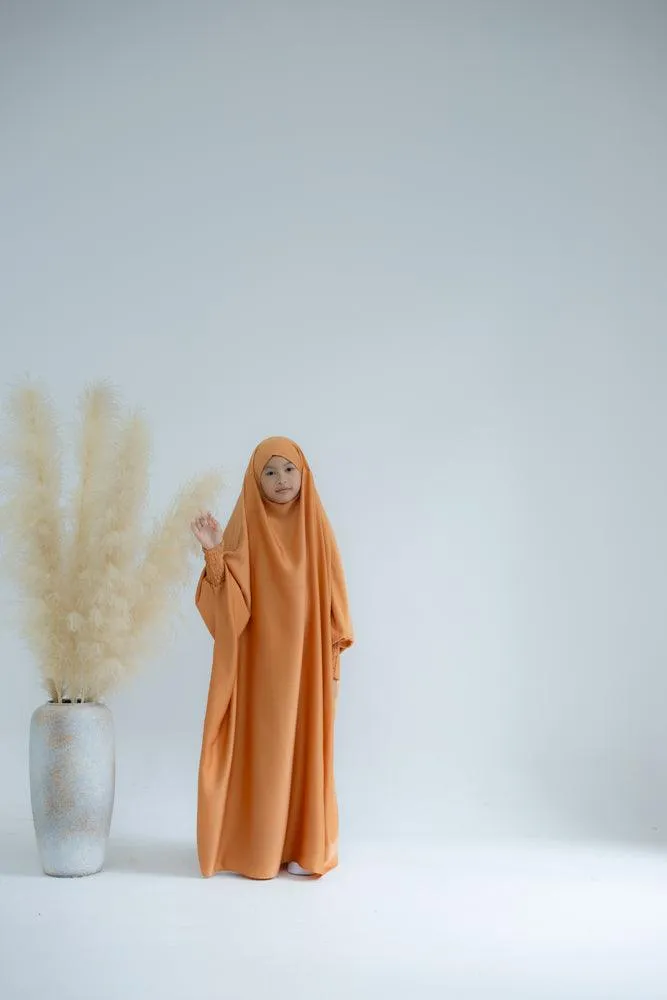 Little Gretaah prayer gown for kids in khimar style with ribbed sleeve cuff in  Orange