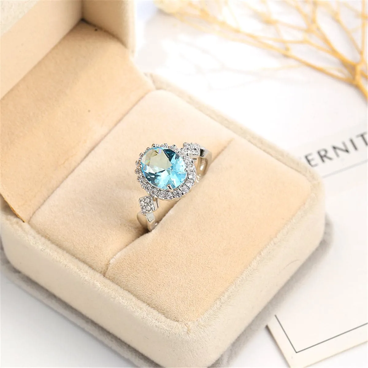 Sea Blue Cubic Zirconia & Crystal Halo Oval Ring