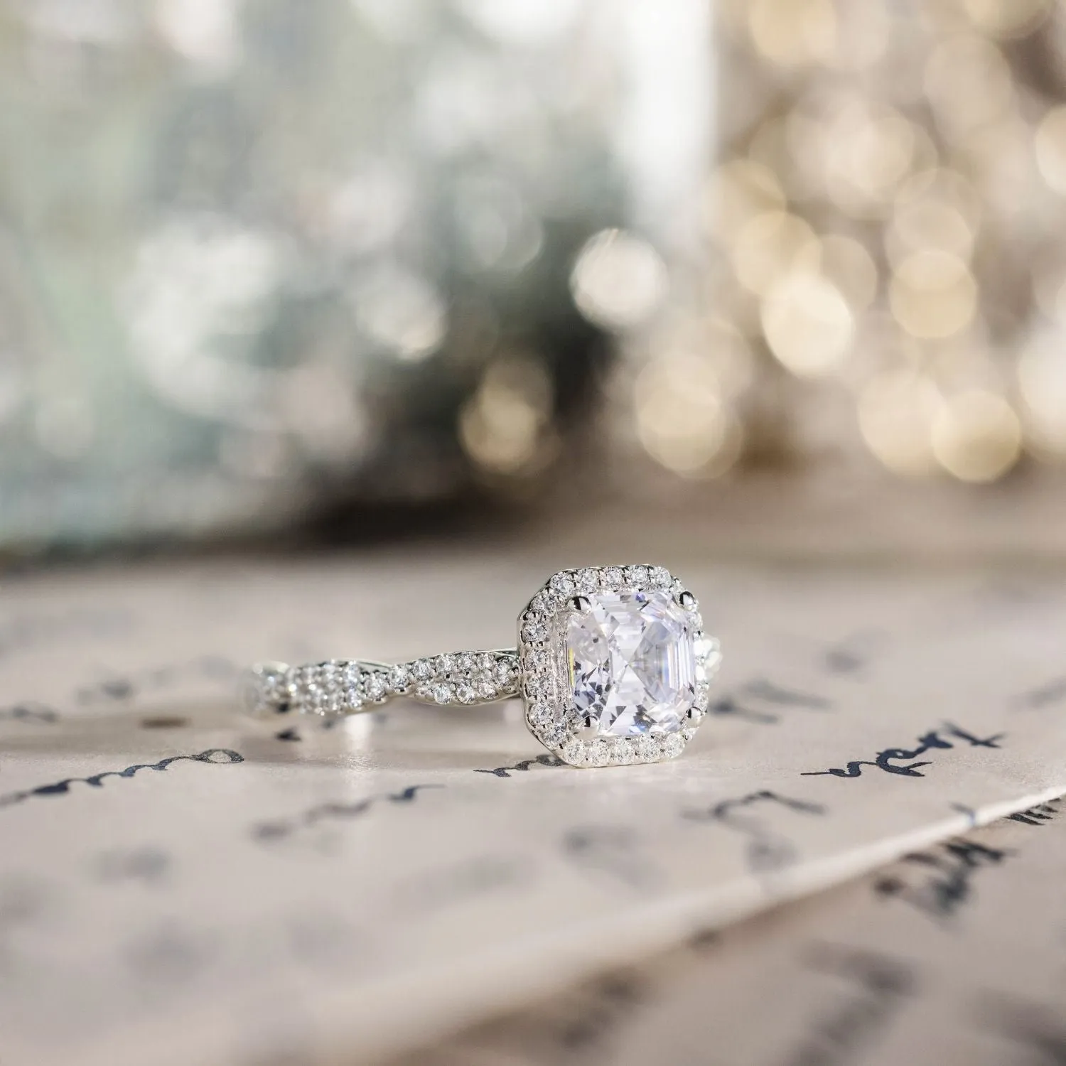 The Augusta - Asscher Halo Diamond Engagement Ring with Twisted Pavé Diamond Setting
