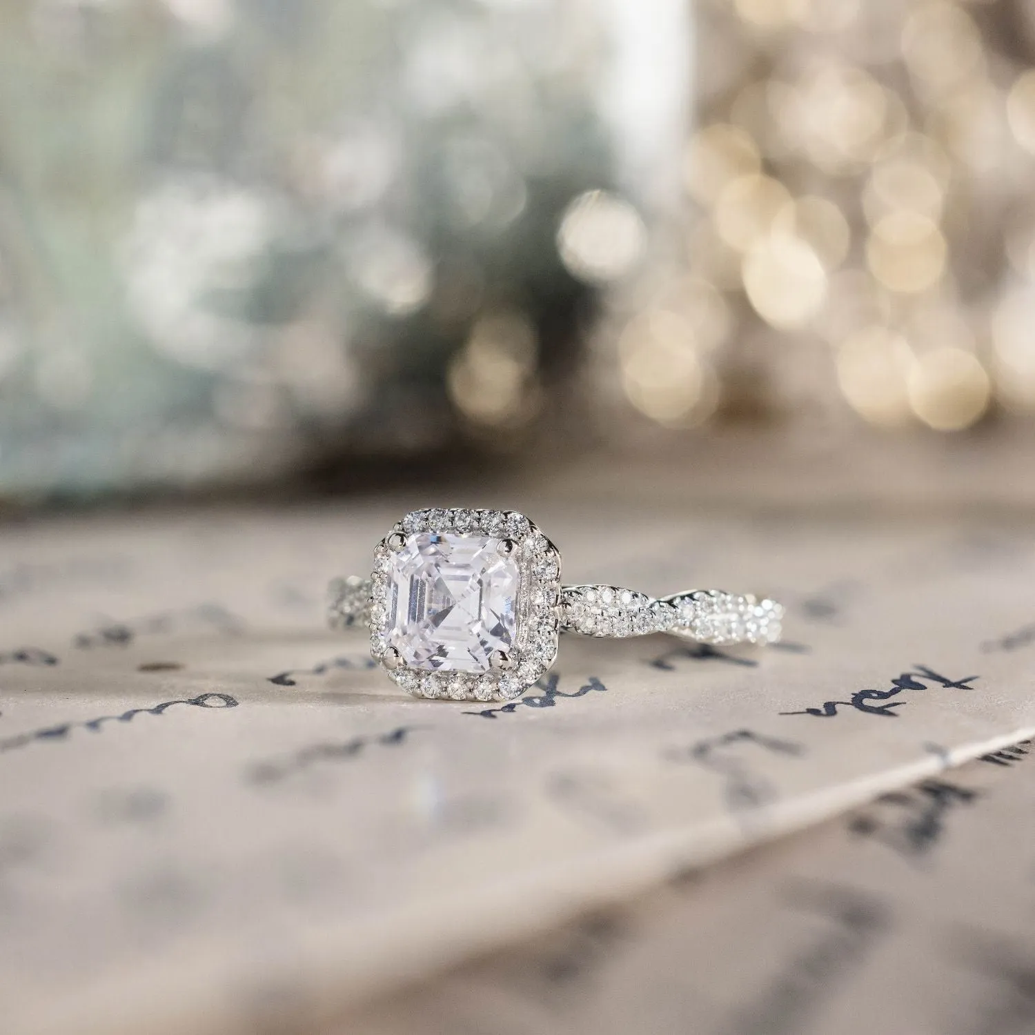 The Augusta - Asscher Halo Diamond Engagement Ring with Twisted Pavé Diamond Setting