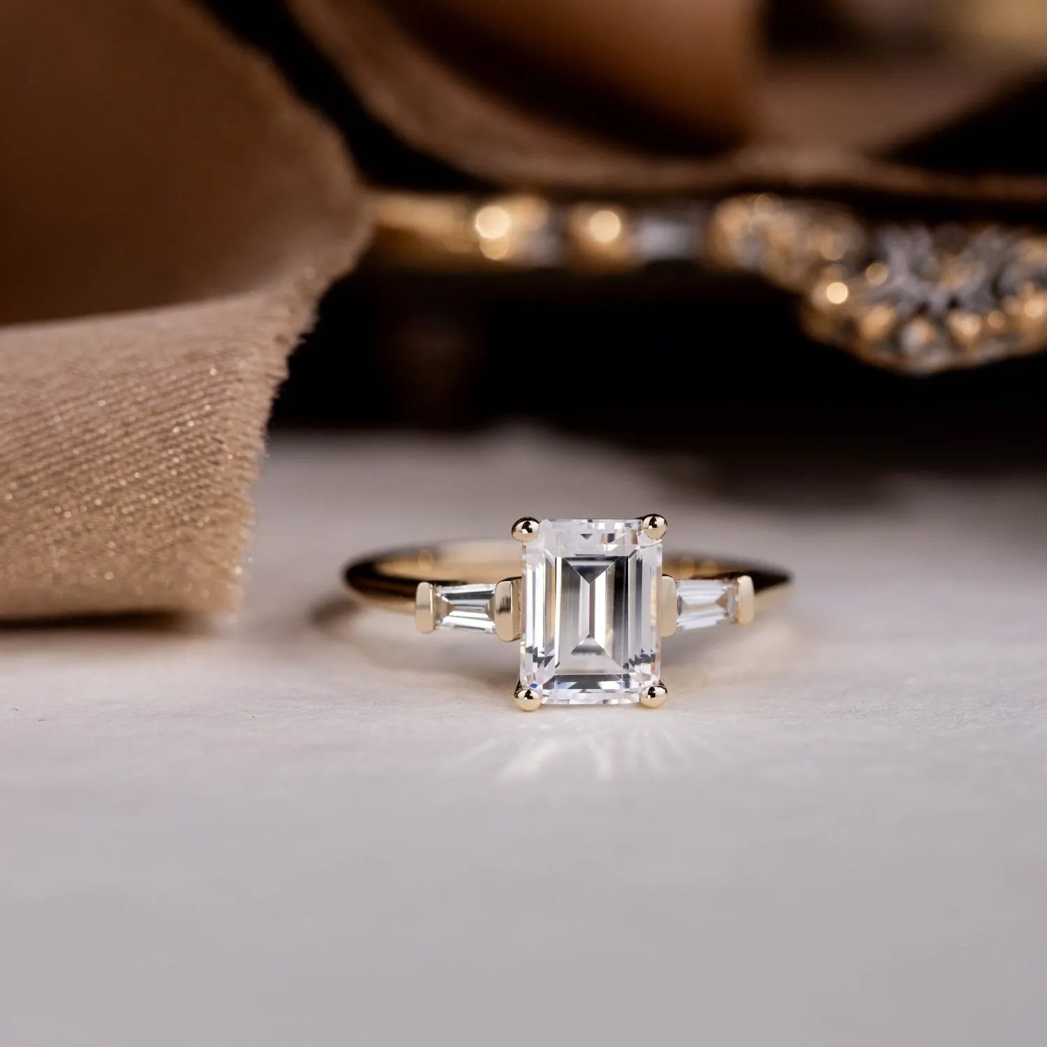 The Charlotte - Three Stone Emerald Cut Diamond Engagement Ring